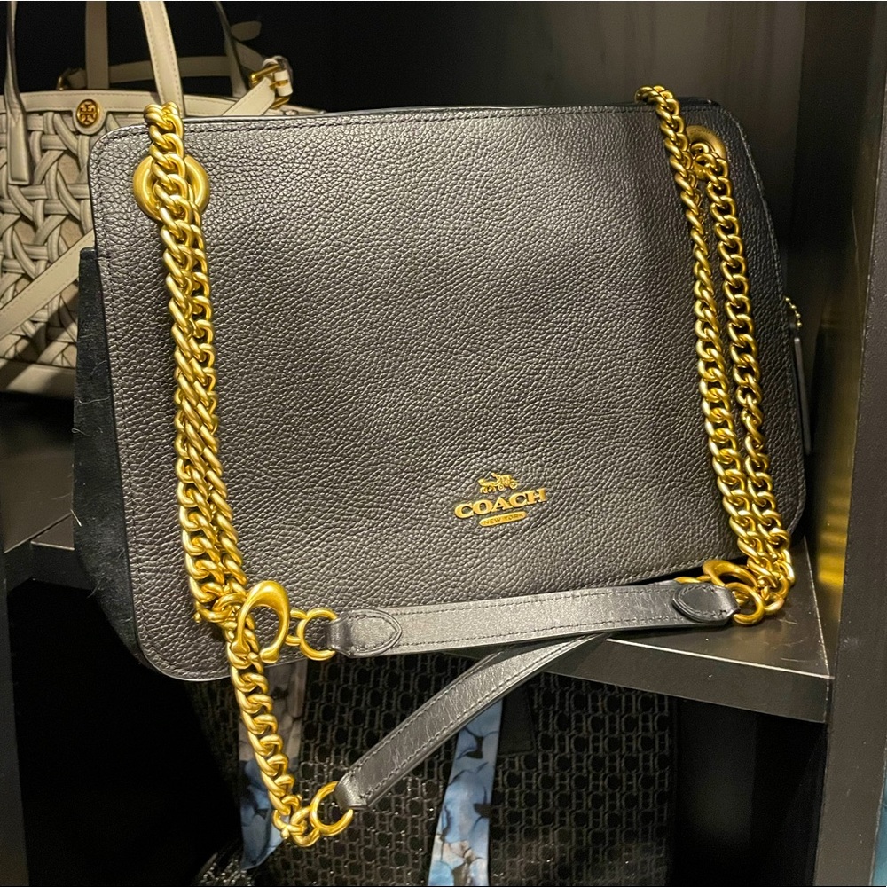 Black coach purse.